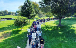 A march through Baker Park in Downtown Frederick.